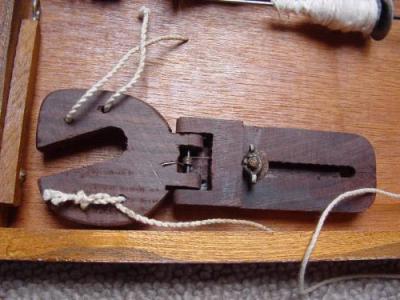 Charkha, Spindelhalter